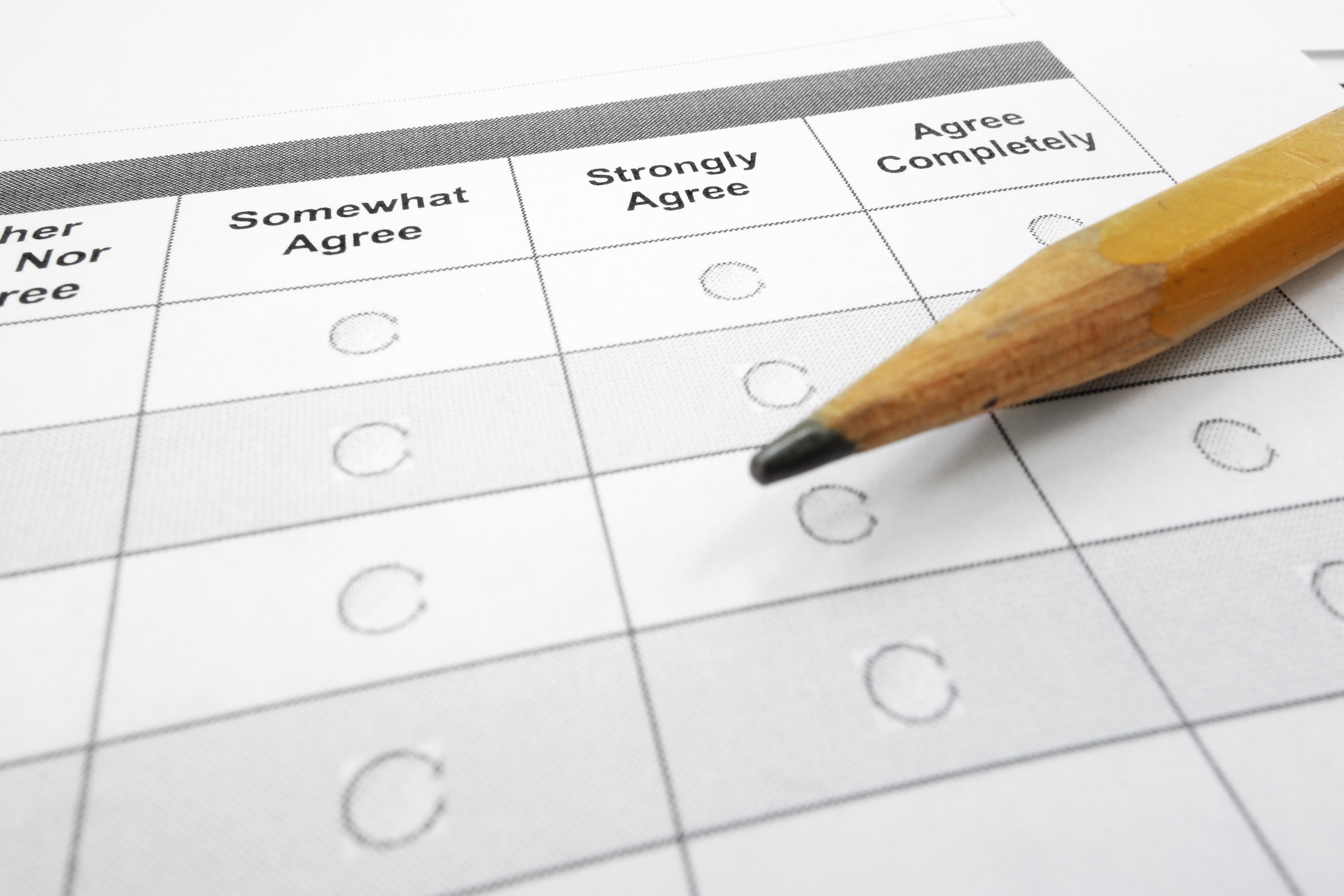 closeup of a survey questionnaire form and pencil            