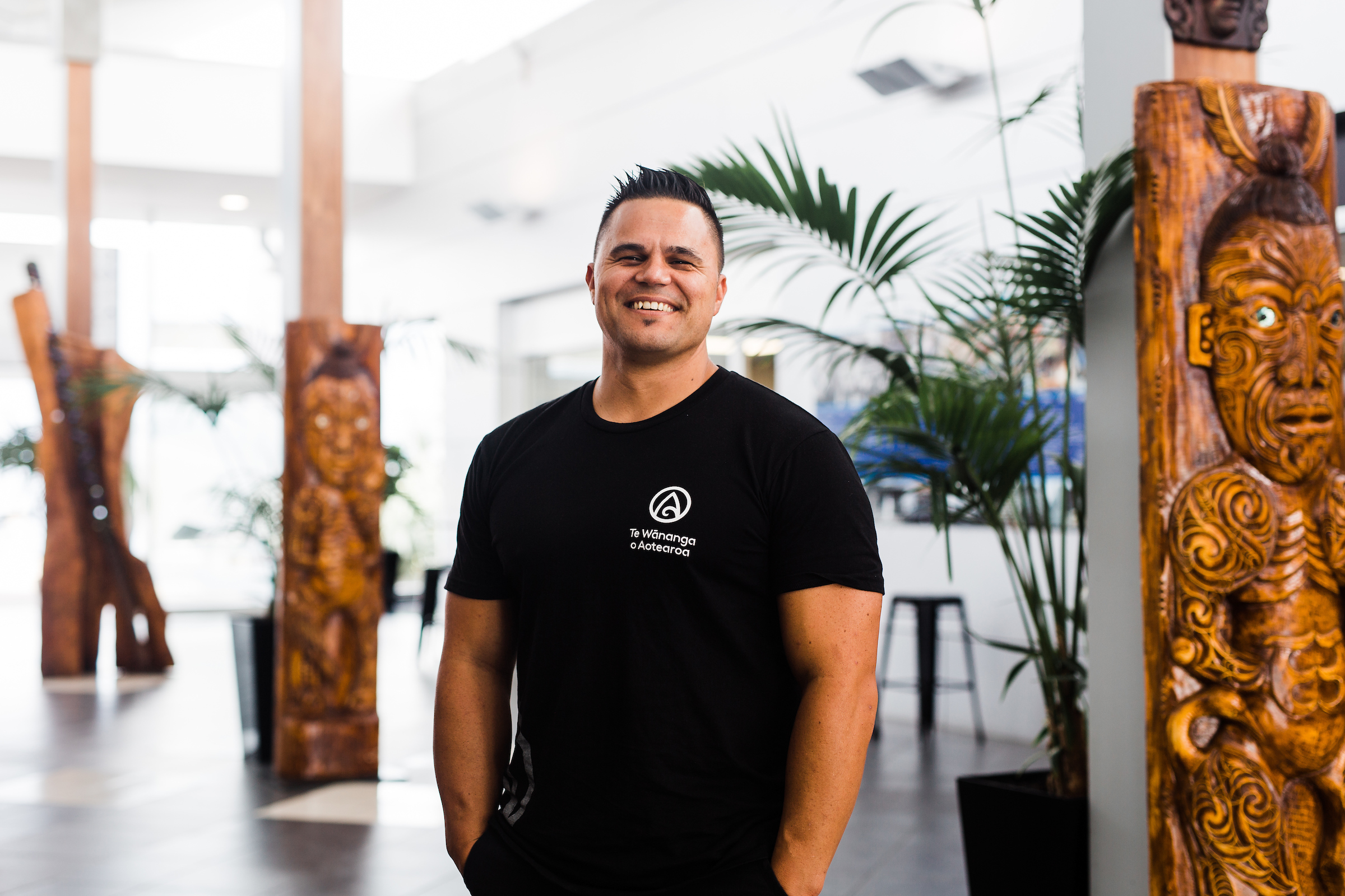 Kaleb Cave standing in TWoA campus 