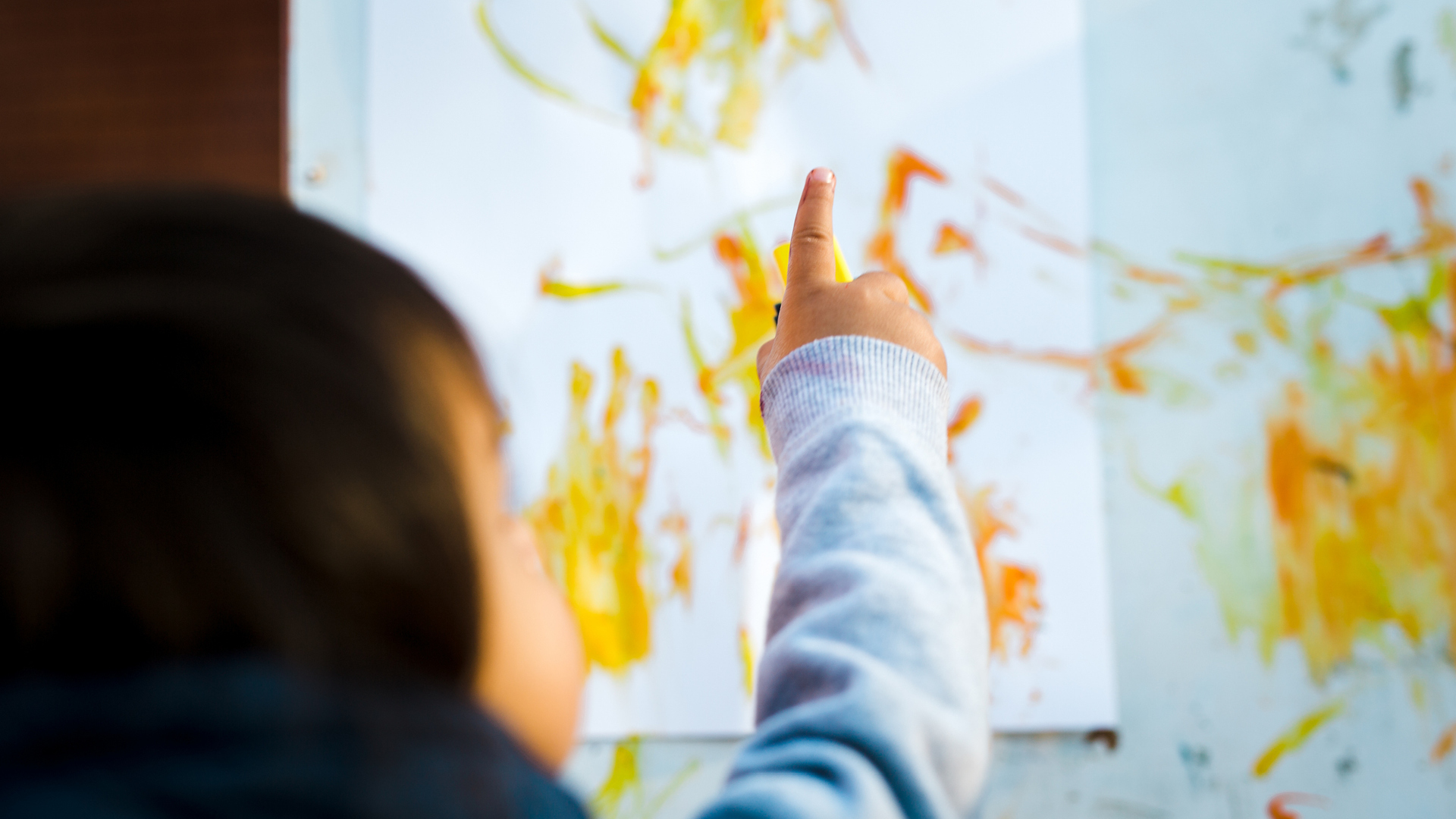 Child finger painting