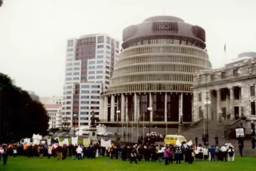 Archival photo of a protest outside the New Zealand Government Beehive building in Wellington