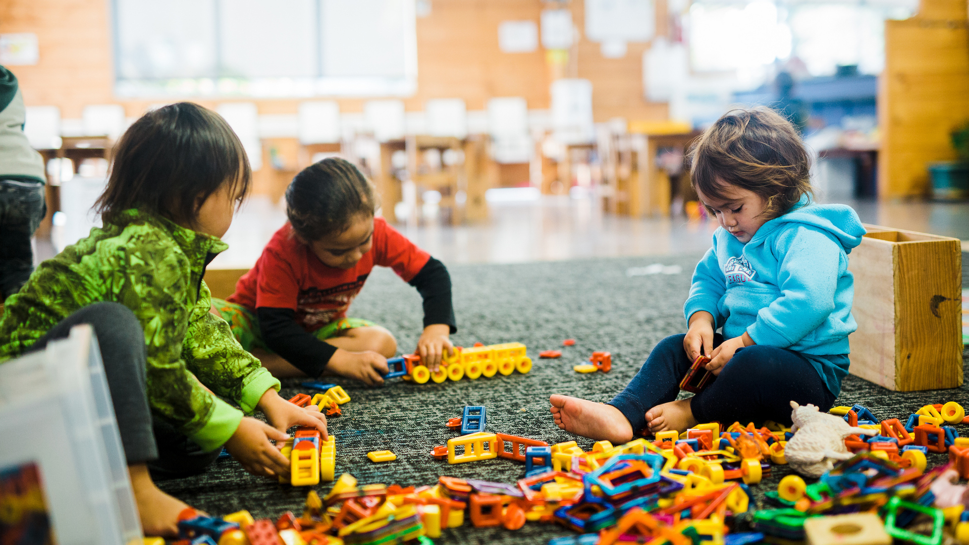 Children playing with blocks in classroom