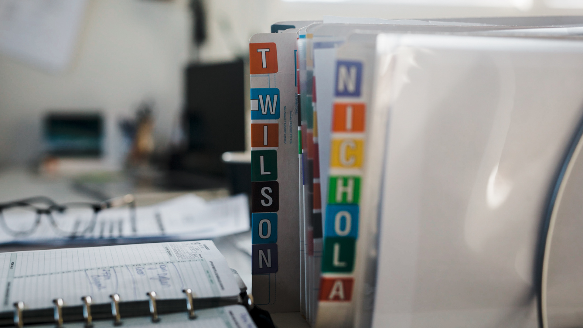 Office stationery and files on a desk
