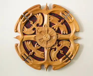 Artist: Fred Graham. Iwi: Ngāti Korokī Kahukura, Tainui. Artwork: Te Wānanga o Aotearoa 2013. Material: Kauri, stainless steel, board 