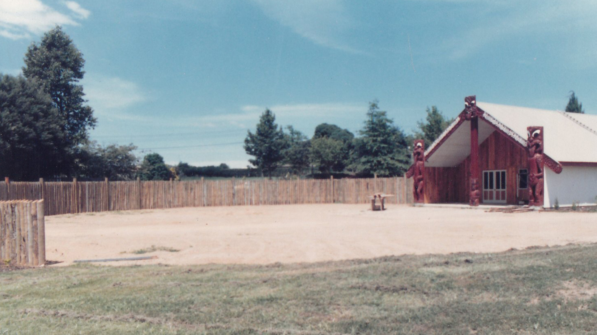 Archival photo of O-Tāwhao marae when it was first built and before the lawn had been reseeded