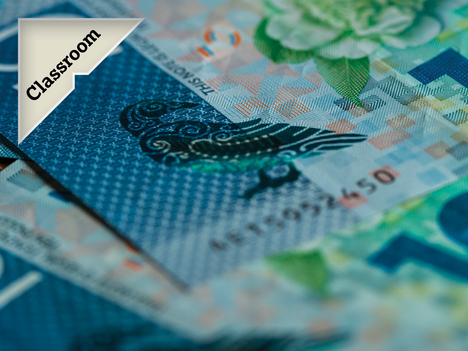 Close up of toi manu on ten dollar note with callout badge for 'Classroom'